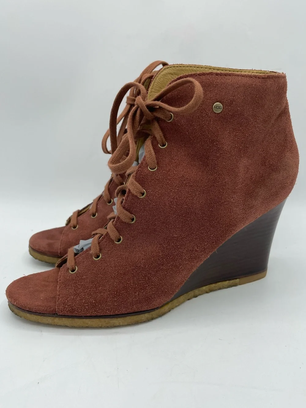 UGG Elyse Rust Suede Lace-Up Wedge Bootie with Open Toe Design.